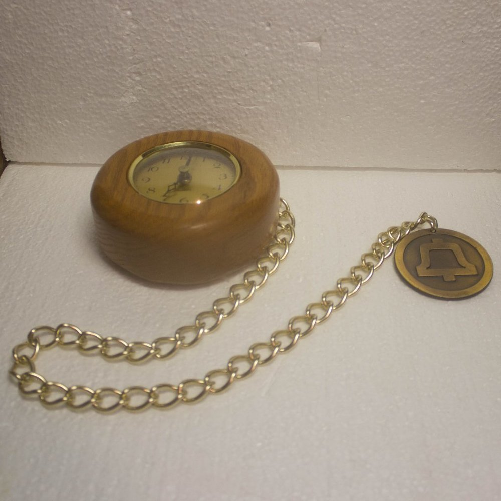 Vintage End of an Era Bell System Medallion and Kienzle Chronoquartz Clock